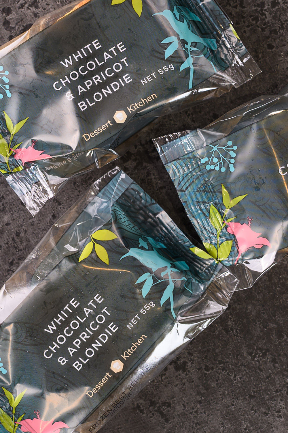 White Chocolate Apricot Blondie packaging on a dark surface. Dessert Kitchen